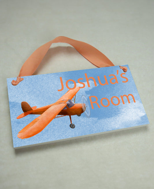 Orange Airplane Door Sign